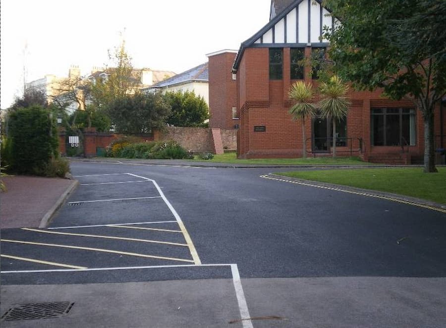 Tarmac road with yellow lines painted on